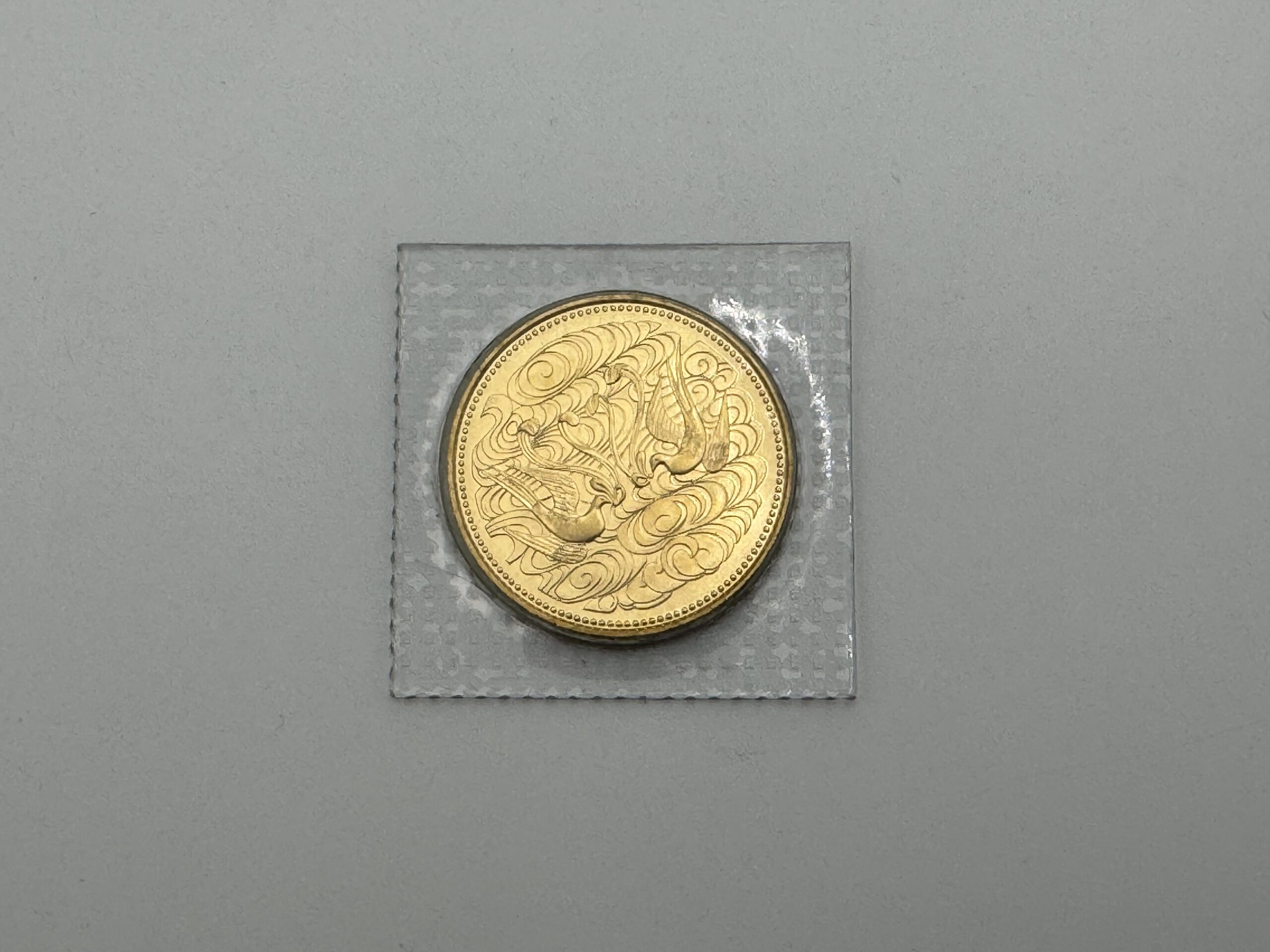 天皇陛下御在位60年記念 10万円金貨